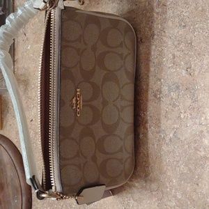NWT small Coach purse.